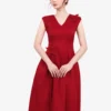Đầm xòe đỏ sát nách cổ V đính hoa